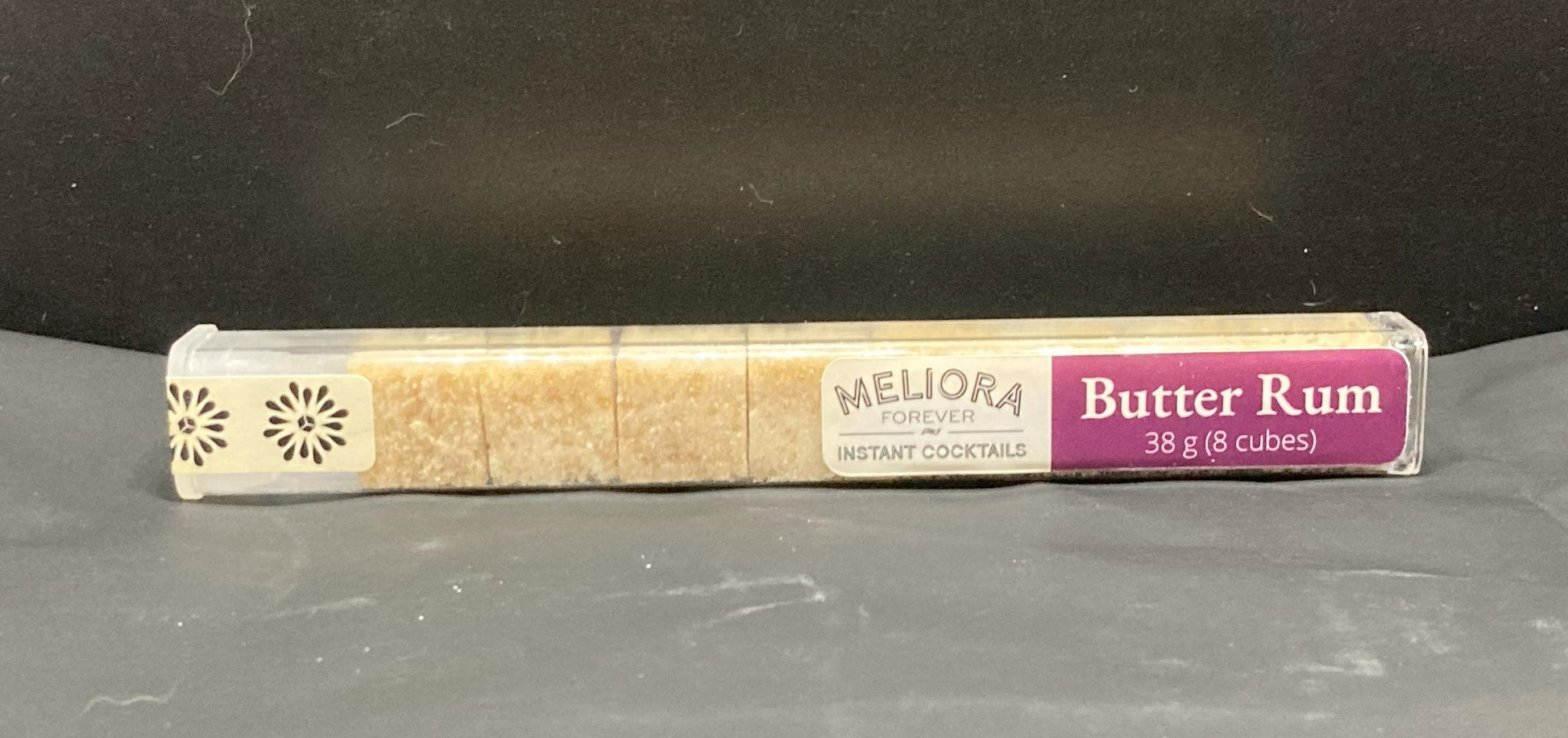Instant cocktail cube to make a Butter Rum Cocktail, which includes Cane sugar, demerara sugar, Bittercube Blackstrap bitters, butter rum compound.