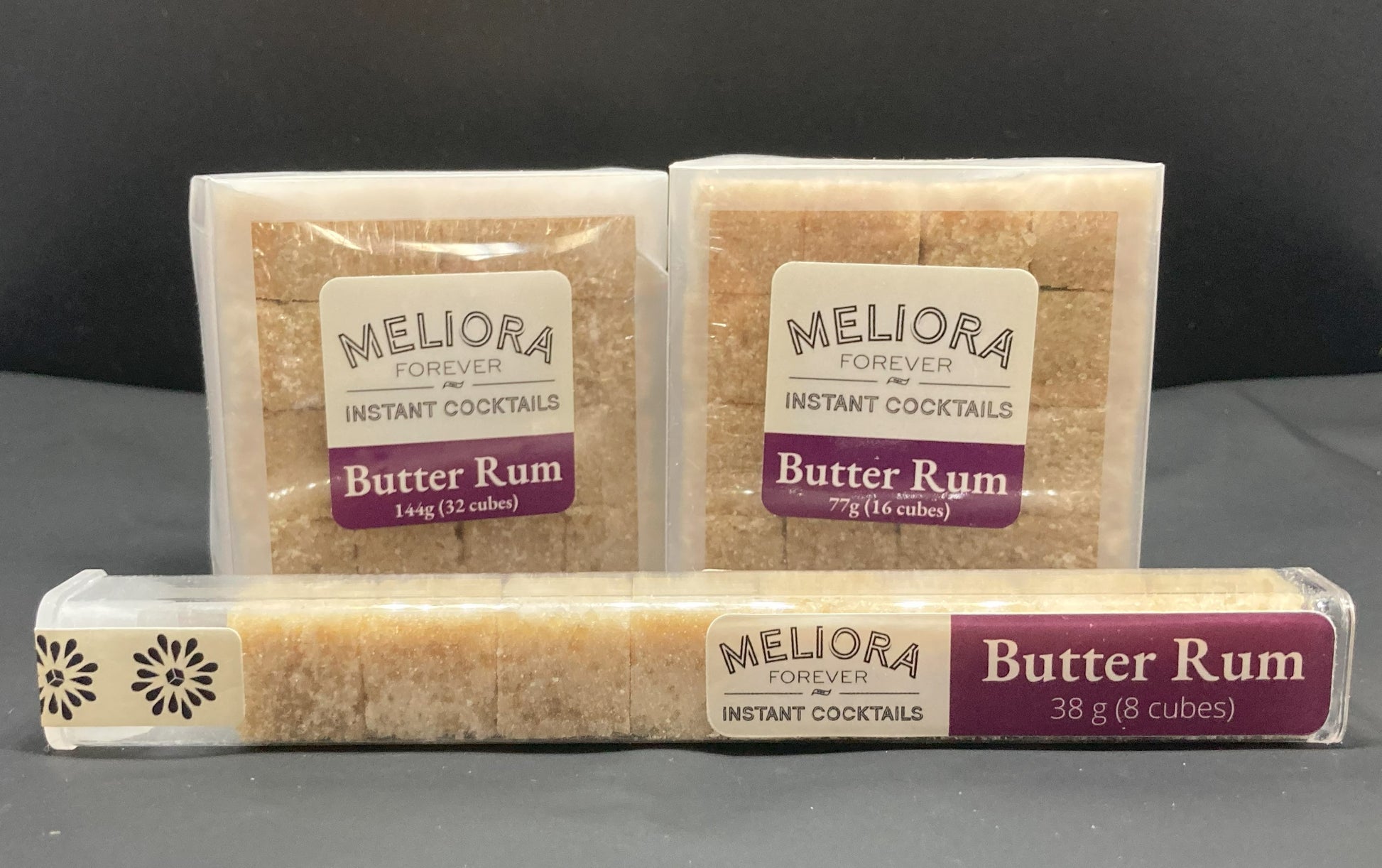 Instant cocktail cube to make a Butter Rum Cocktail, which includes Cane sugar, Demerara sugar, Bittercube Blackstrap bitters, butter rum compound. 8 Count Tube, 16 Count Box and 32 Count Box.