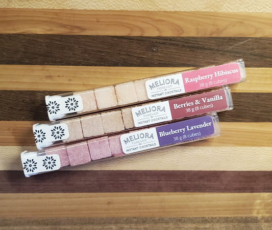 instant cocktail cubes, including 3 different flavors. Sugar cubes infused with bitters, fruits, and natural flavors. Each flavor is packaged in an 8-count tube. Flavors include Berries and Vanilla (Wild Berry, Cherry and Vanilla), Blueberry Lavender (Blueberry, Lavender with a Hint of Lemon) and Raspberry Hibiscus.