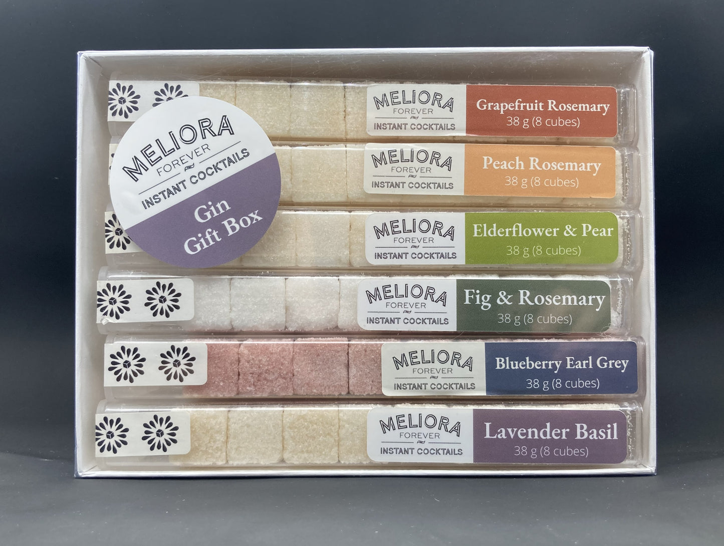instant cocktail cubes, including 6 different flavors. Sugar cubes infused with bitters, fruits, and natural flavors. Each flavor is packaged in an 8-count tube. Flavors include Grapefruit Rosemary, Peach Rosemary, Elderflower & Pear, Fig & Rosemary, Blueberry Earl Grey and Lavender Basil.