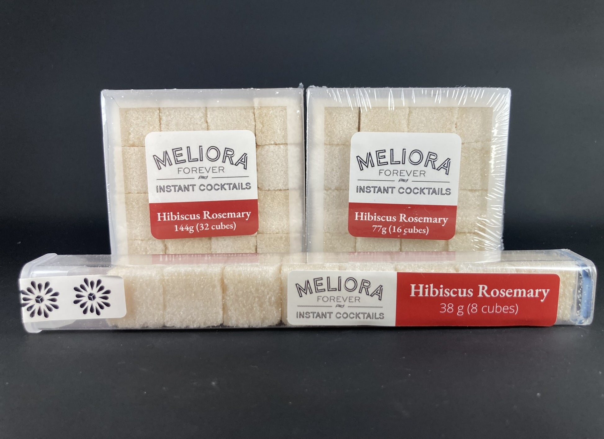Instant cocktail cube to make a Hibiscus Rosemary Cocktail, which includes Cane sugar, Bittermens Burlesque bitters, hibiscus extract, rosemary extract. 8 Count Tube, 16 Count Box and 32 Count Box