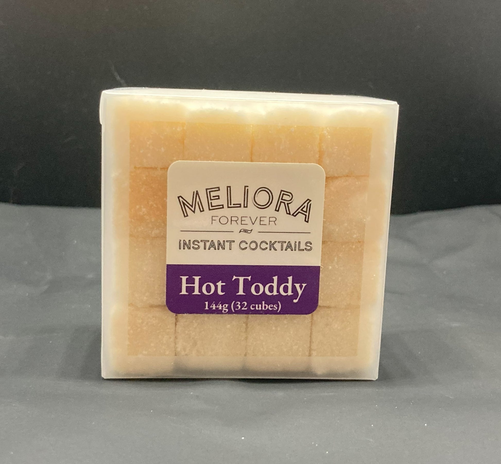 Instant cocktail cube to make a Hot Toddy (Ginger, Honey, Lemon) Cocktail, which includes Cane sugar, Demerara sugar, Bittermens Burlesque bitter, Bittermens Krynhik bitters, ginger extract, honey extract, lemon extract, lemon artisan flavor, cinnamon extract. 32 Count Box.