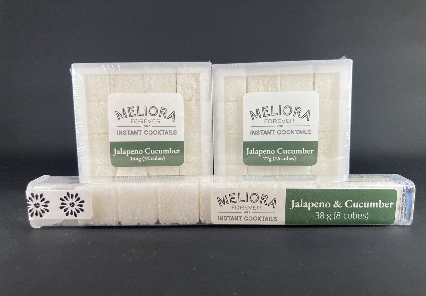 Instant cocktail cube to make a Jalapeno Cucumber Cocktail, which includes Cane sugar, King Floyd's 3.4 fl. oz. green chili bitters, jalapeno extract, cucumber extract, jalapeno powder, cucumber powder. 8 Count Tube, 16 Count Box and 32 Count Box.
