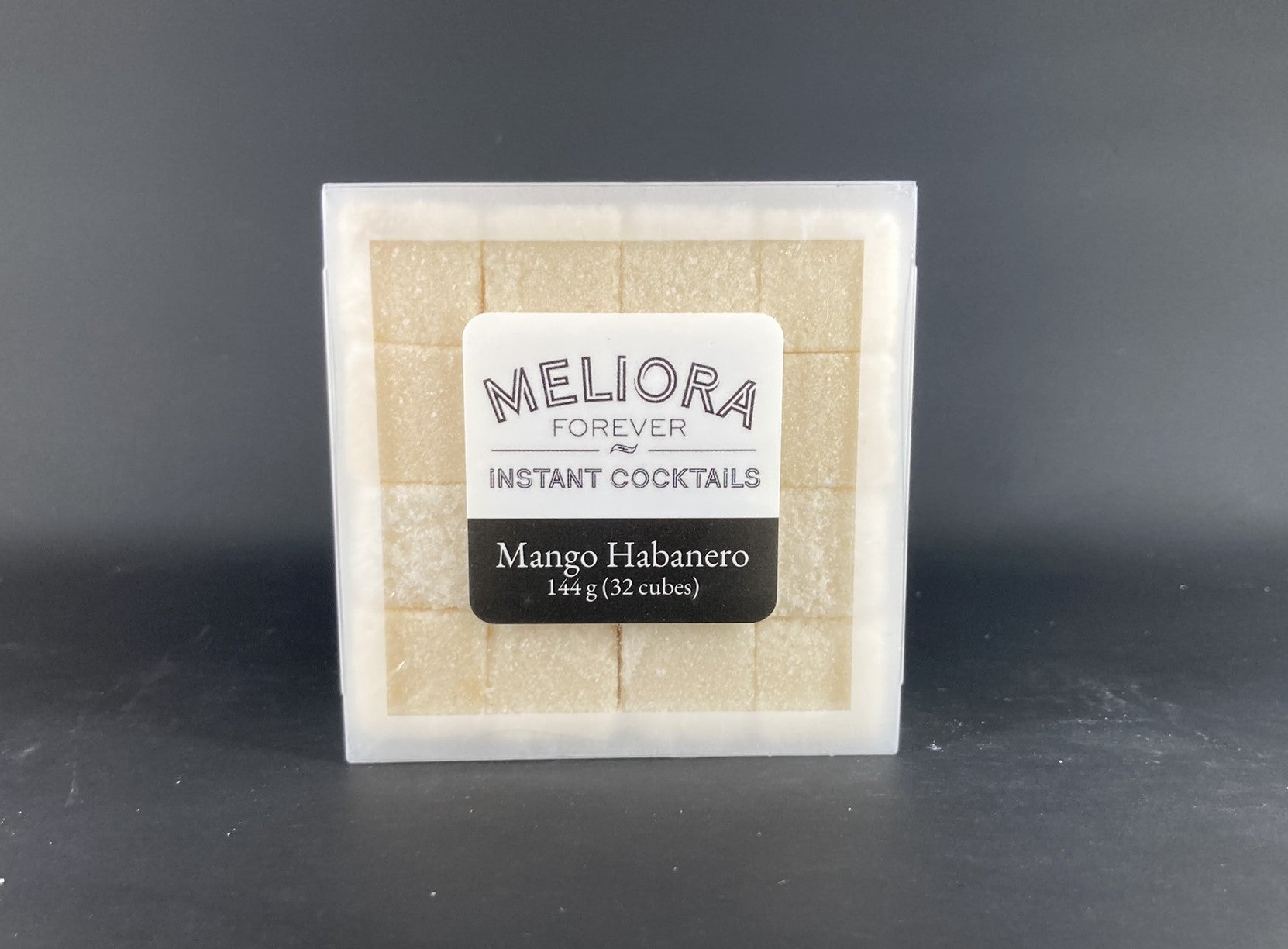 Instant cocktail cube to make a Mango Habanero Cocktail, which includes Cane sugar, Scrappy's Lime bitters, Bittermens Hellfire bitters, habanero mango concentrate, mango extract, mango powder, habanero powder.