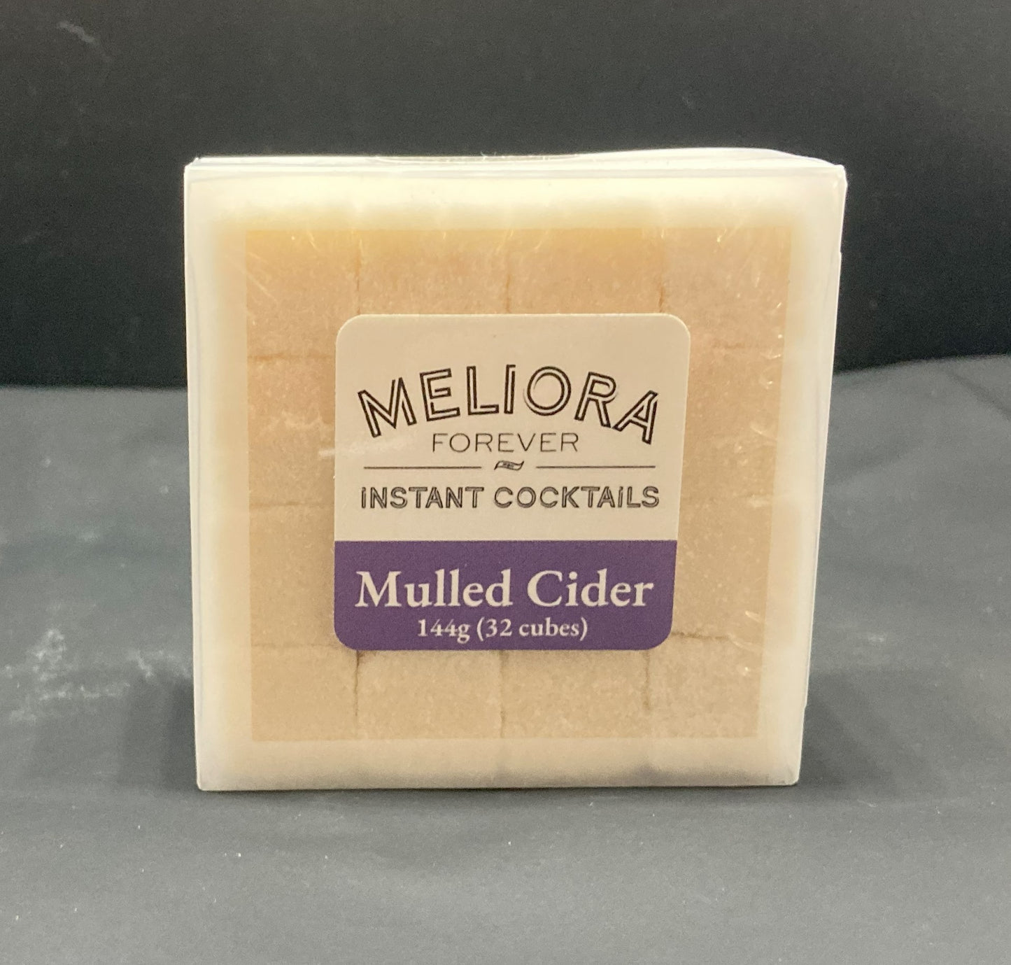Instant cocktail cube to make a Mulled Cider (Apple, Cinnamon, Orange, Spices) Cocktail, which includes Cane sugar, Bar Keep Organic Apple bitters, apple extract, orange extract, cinnamon extract, spice extract, ginger extract, orange powder, apple powder, cinnamon powder. 32 Count Box.
