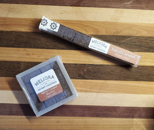 Salted Caramel instant cocktail cubes, which are Cane Sugar Cubes infused with bitters, fruits, and natural flavors. There are two packages shown, including an 8-count tube, and a 16-count box.
