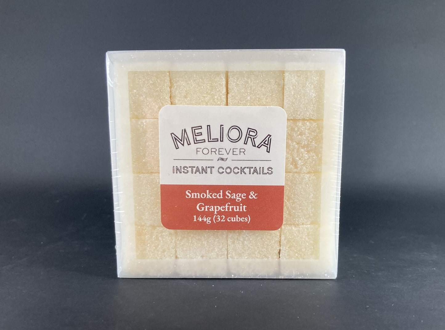 Instant cocktail cube to make a Smoked Sage & Grapefruit Cocktail, which includes Cane sugar, Scrappy’s Grapefruit bitters, grapefruit extract, smoked extract, sage extract, grapefruit powder, smoke powder, grapefruit artisan flavor. 32 Count Box.