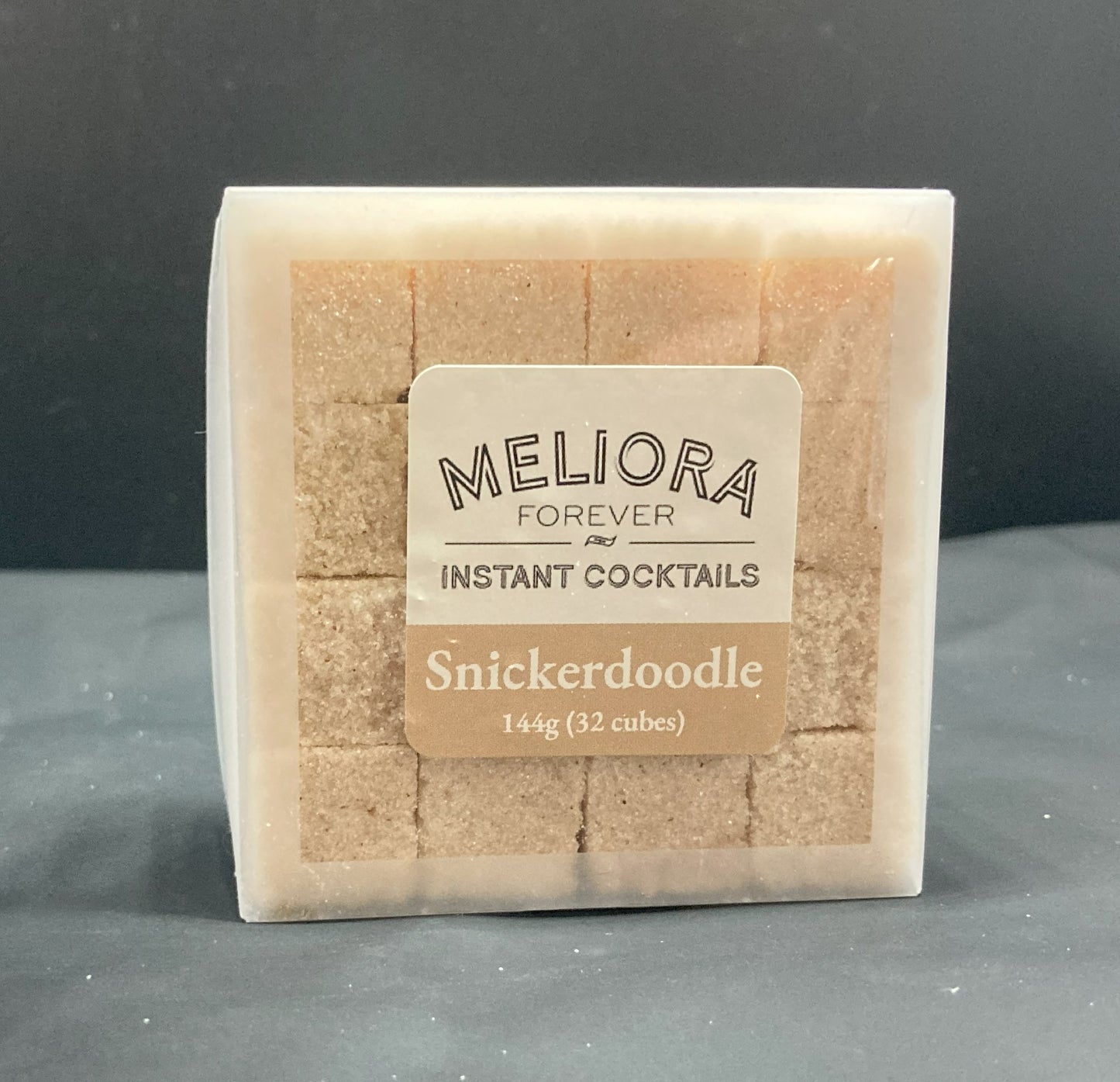 Instant cocktail cube to make a Snickerdoodle (Cinnamon, Vanilla) Cocktail, which includes Cane sugar, Old Forester Smoked Cinnamon bitters, cinnamon extract, ground cinnamon, vanilla extract, vanilla paste. 32 Count Box.