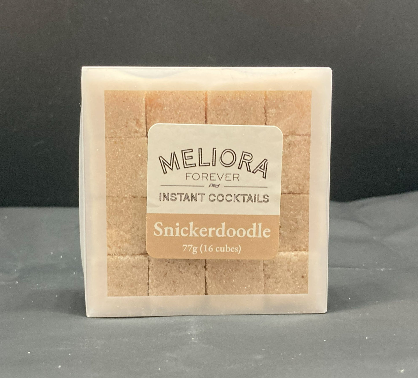 Instant cocktail cube to make a Snickerdoodle (Cinnamon, Vanilla) Cocktail, which includes Cane sugar, Old Forester Smoked Cinnamon bitters, cinnamon extract, ground cinnamon, vanilla extract, vanilla paste. 16 Count Box.
