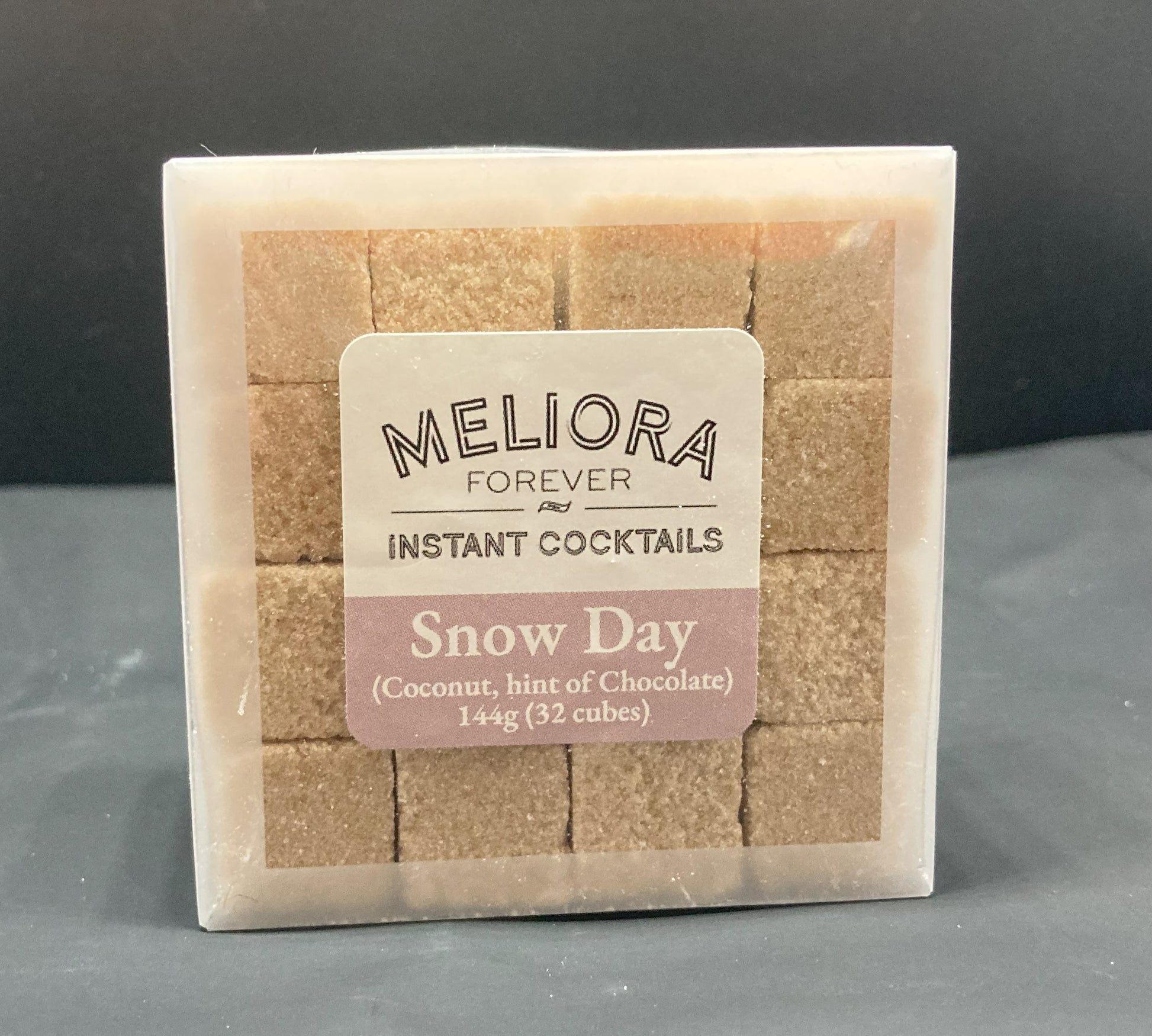 Instant cocktail cube to make a Snow Day (coconut, Hint of chocolate) Cocktail, which includes Cane sugar, Bittermens Xocolatl Mole bitters, coconut extract, coconut flavor powder, coconut artisan flavor, Woodford Reserve chocolate bitters, chocolate extract, Ghirardelli cocoa powder. 32 Count Box.