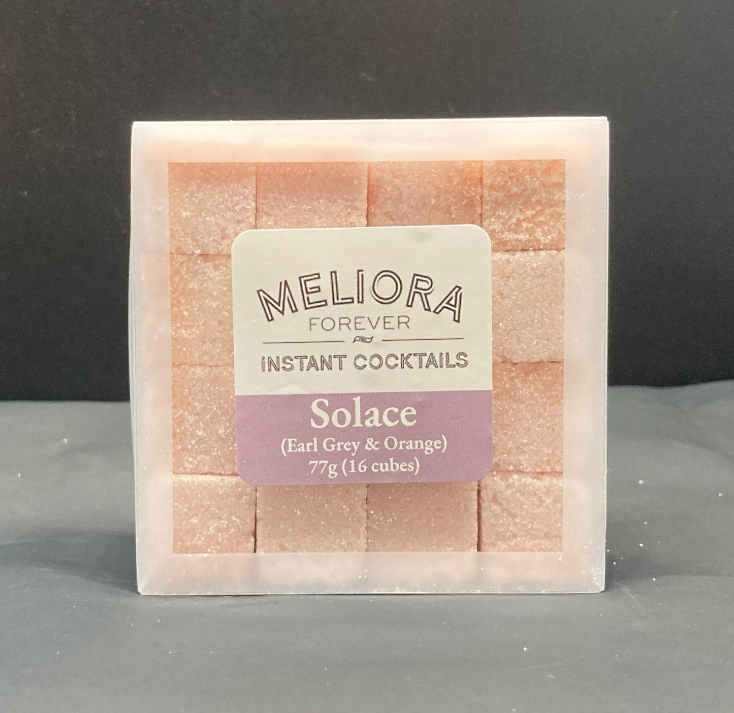 Instant cocktail cube to make a Solace (Earl Grey & Orange) Cocktail, which includes Cane sugar, Angostura Aromatic bitters, 18.21 Earl Grey bitters, earl grey extract, orange extract, earl grey powder, orange powder. 16 Count Box.