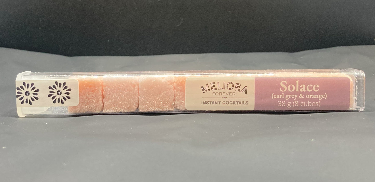 Instant cocktail cube to make a Solace (Earl Grey & Orange) Cocktail, which includes Cane sugar, Angostura Aromatic bitters, 18.21 Earl Grey bitters, earl grey extract, orange extract, earl grey powder, orange powder. 8 Count Tube.