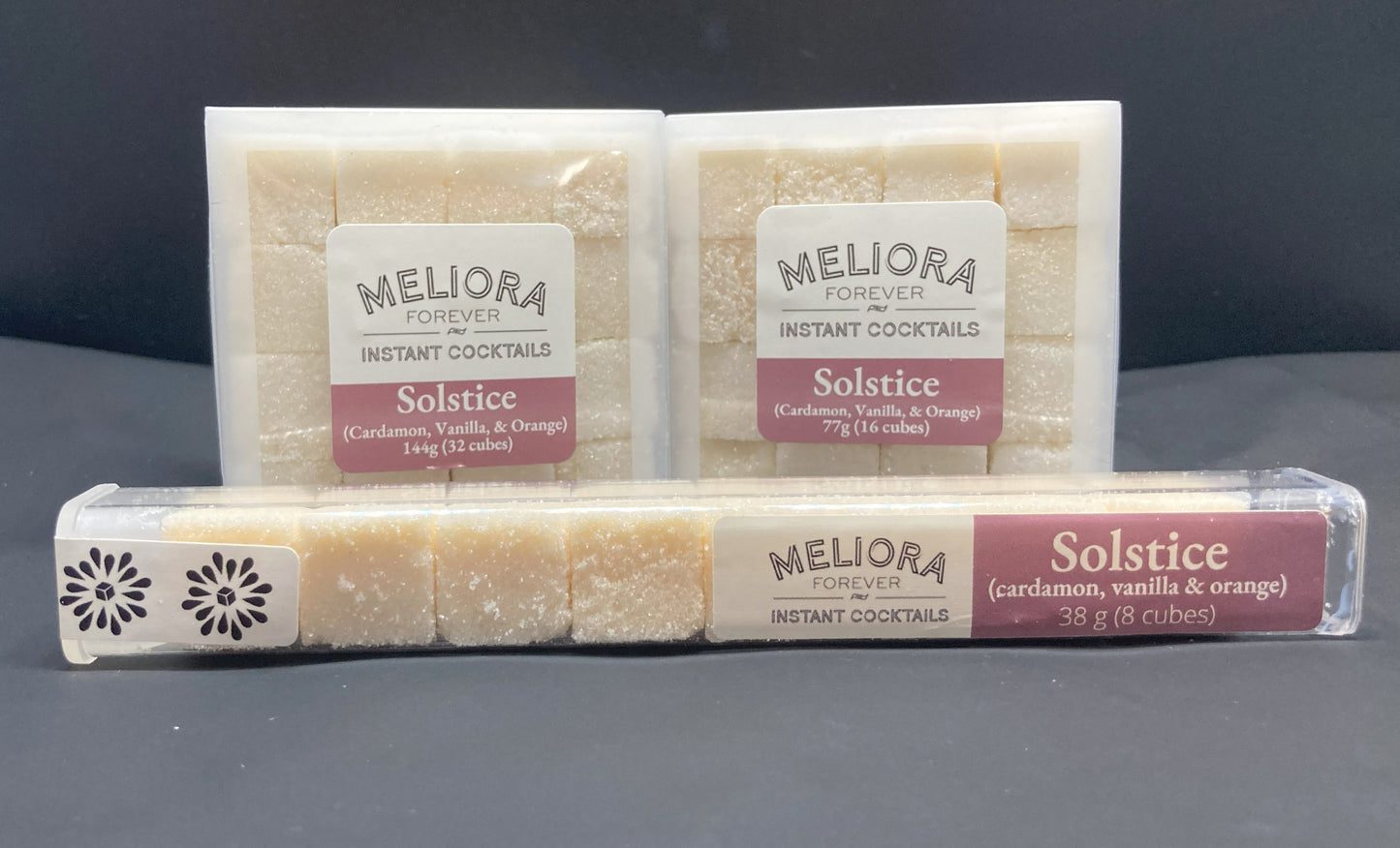 Instant cocktail cube to make a Solstice (Cardamom, Vanilla & Orange) Cocktail, which includes Cane sugar, King Floyd's Cardamom bitters, cardamom extract, vanilla extract, cardamom flavor powder, orange extract. 8 Count Tube, 16 Count Box and 32 Count Box.