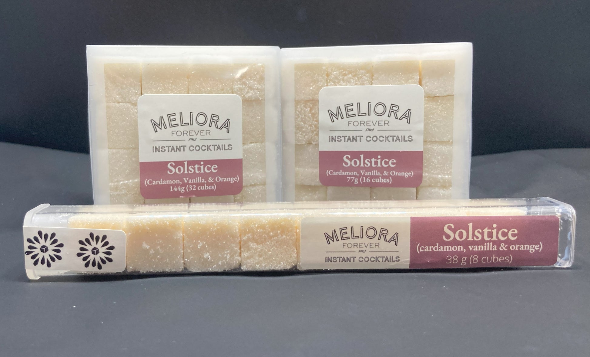 Instant cocktail cube to make a Solstice (Cardamom, Vanilla & Orange) Cocktail, which includes Cane sugar, King Floyd's Cardamom bitters, cardamom extract, vanilla extract, cardamom flavor powder, orange extract. 8 Count Tube, 16 Count Box and 32 Count Box.