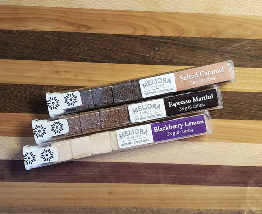 instant cocktail cubes, including 3 different flavors. Sugar cubes infused with bitters, fruits, and natural flavors. Each flavor is packaged in an 8-count tube. Flavors include Blackberry Lemon (Blackberry and Lemon), Salted Caramel (Salted Caramel and Caramel) and Espresso Martini.