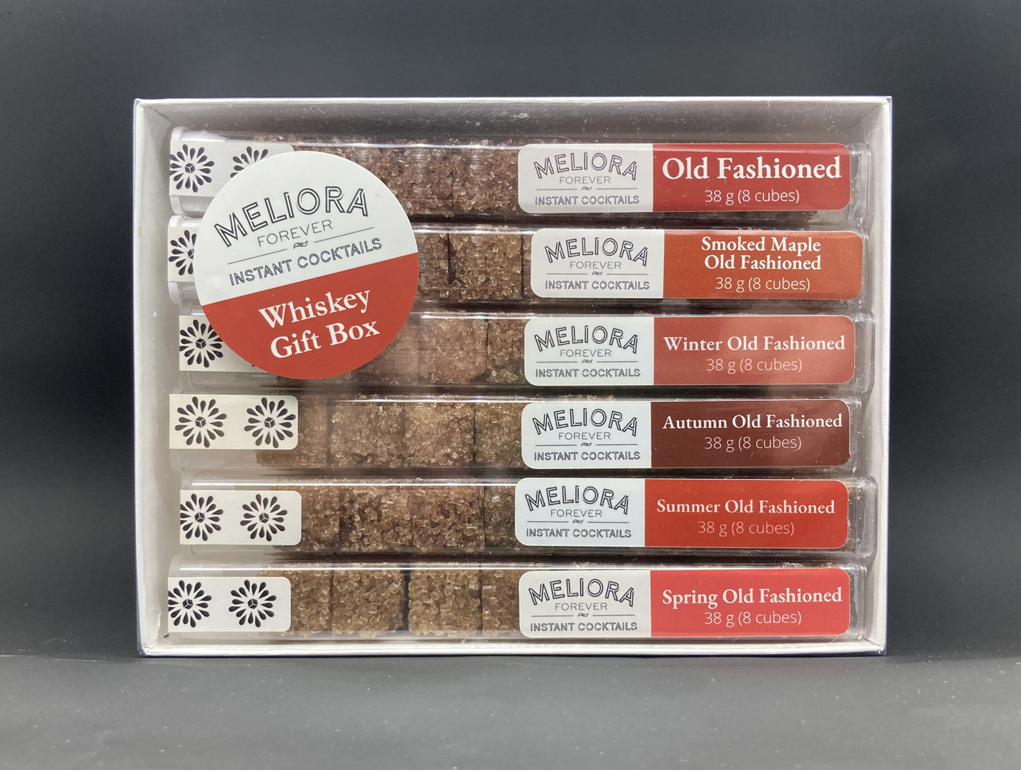 instant cocktail cubes, including 6 different flavors. Sugar cubes infused with bitters, fruits, and natural flavors. Each flavor is packaged in an 8-count tube. Flavors include Old Fashioned, Smoked Maple Old Fashioned, Winter Old Fashioned, Autumn Old Fashioned, Summer Old Fashioned and Spring Old Fashioned.