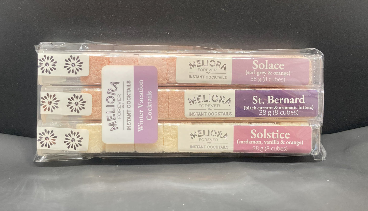 Winter Vacation instant cocktail cubes, including 3 different flavors. Sugar cubes infused with bitters, fruits, and natural flavors. Each flavor is packaged in an 8 Count tube. Flavors include Solace (Earl Grey & Orange), St. Bernard (Black Currant & Aromatic Bitters) and Solstice (Cardamom, Vanilla & Orange).