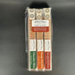instant cocktail cubes, which are cane sugar cubes infused with bitters, fruits, and natural flavors. There are three packages shown, including 8-count tubes of Chocolate Strawberry, Orange Chocolate and Chocolate Mint.