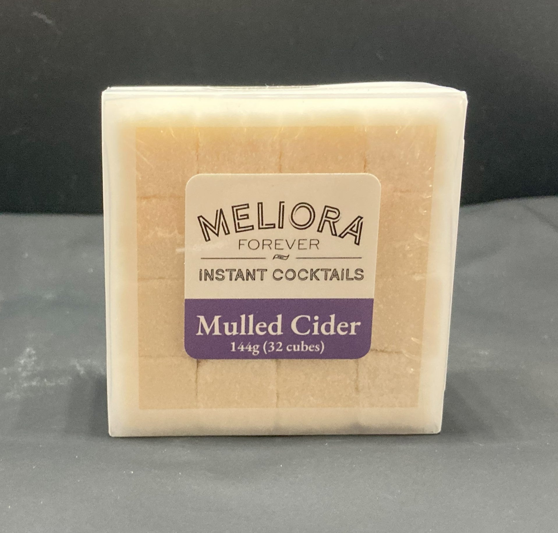 Instant cocktail cube to make a Mulled Cider (Apple, Cinnamon, Orange, Spices) Cocktail, which includes Cane sugar, Bar Keep Organic Apple bitters, apple extract, orange extract, cinnamon extract, spice extract, ginger extract, orange powder, apple powder, cinnamon powder. 32 Count Box. 