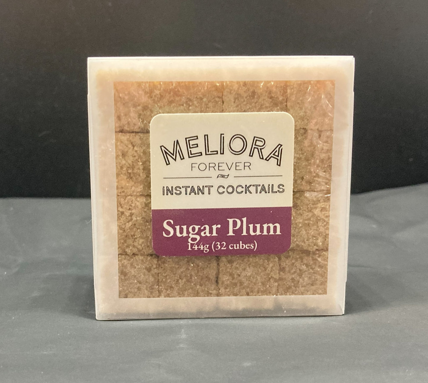 Instant cocktail cube to make a Sugar Plum Cocktail, which includes Demerara sugar, cane sugar, Bittercube blackstrap bitters, plum extract, plum compound, plum powder. 32 Count Box. 