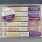 instant cocktail cubes, including 6 different flavors. Sugar cubes infused with bitters, fruits, and natural flavors. Each flavor is packaged in an 8-count tube. Flavors include St Bernard (Black Currant, Aromatic Bitters), Solstice (Cardamom, Vanilla, Orange), Mulled Cider, Butter Rum, Solace and Hot Toddy. 